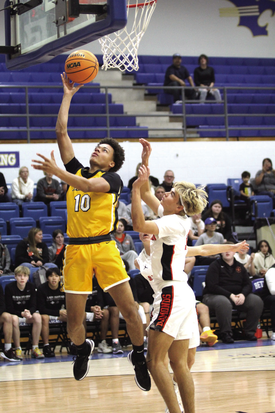 Tecumseh’s Jekhi Owens takes it to the hoop in the first quarter of the Bethel First United Tournament Consolation Championship with Sallisaw on Dec. 14. The Savages lost to Pauls Valley, 60-62; beat Bethel, 71-52; and fell to Sallisaw, 60-79. Countywide & Sun/Natasha Dunagan