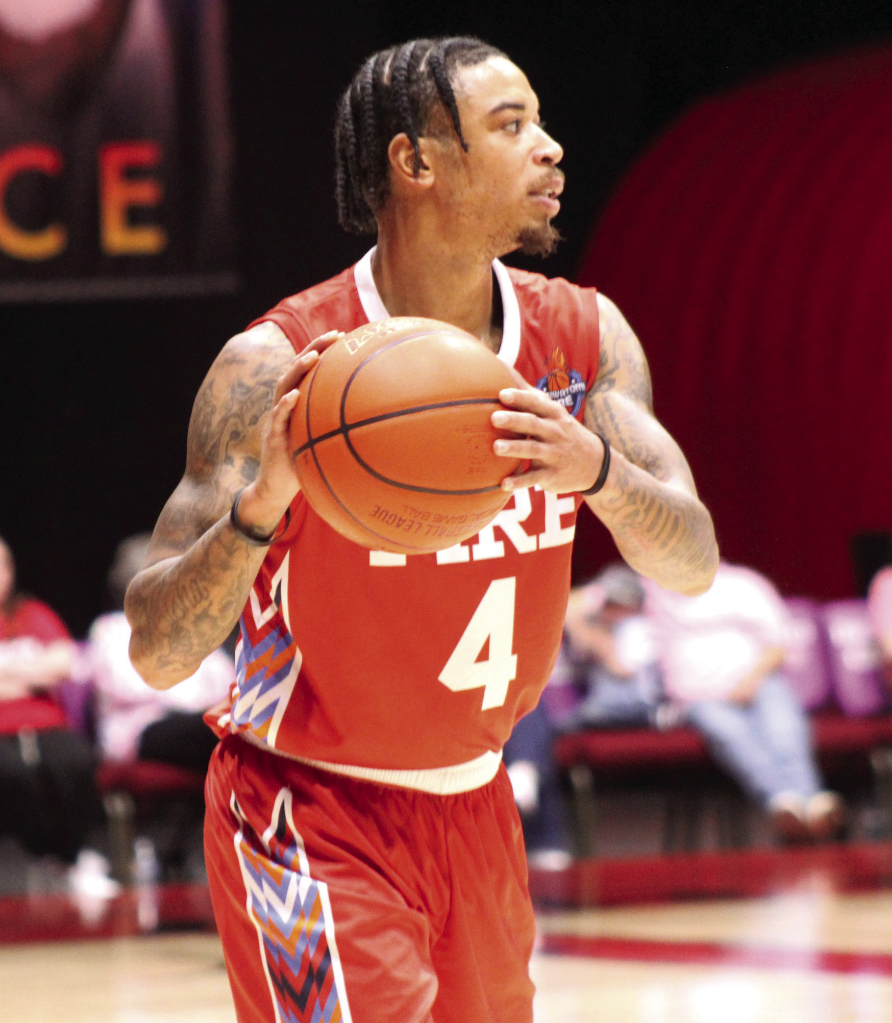 Potawatomi Fire Guard Chuck Guy looks for an opening to pass. Guy is The Basketball League's two-time MVP. Photos by Natasha Dunagan, Countywide & Sun. Click on the camera banner ad below to see all the photos from the game!