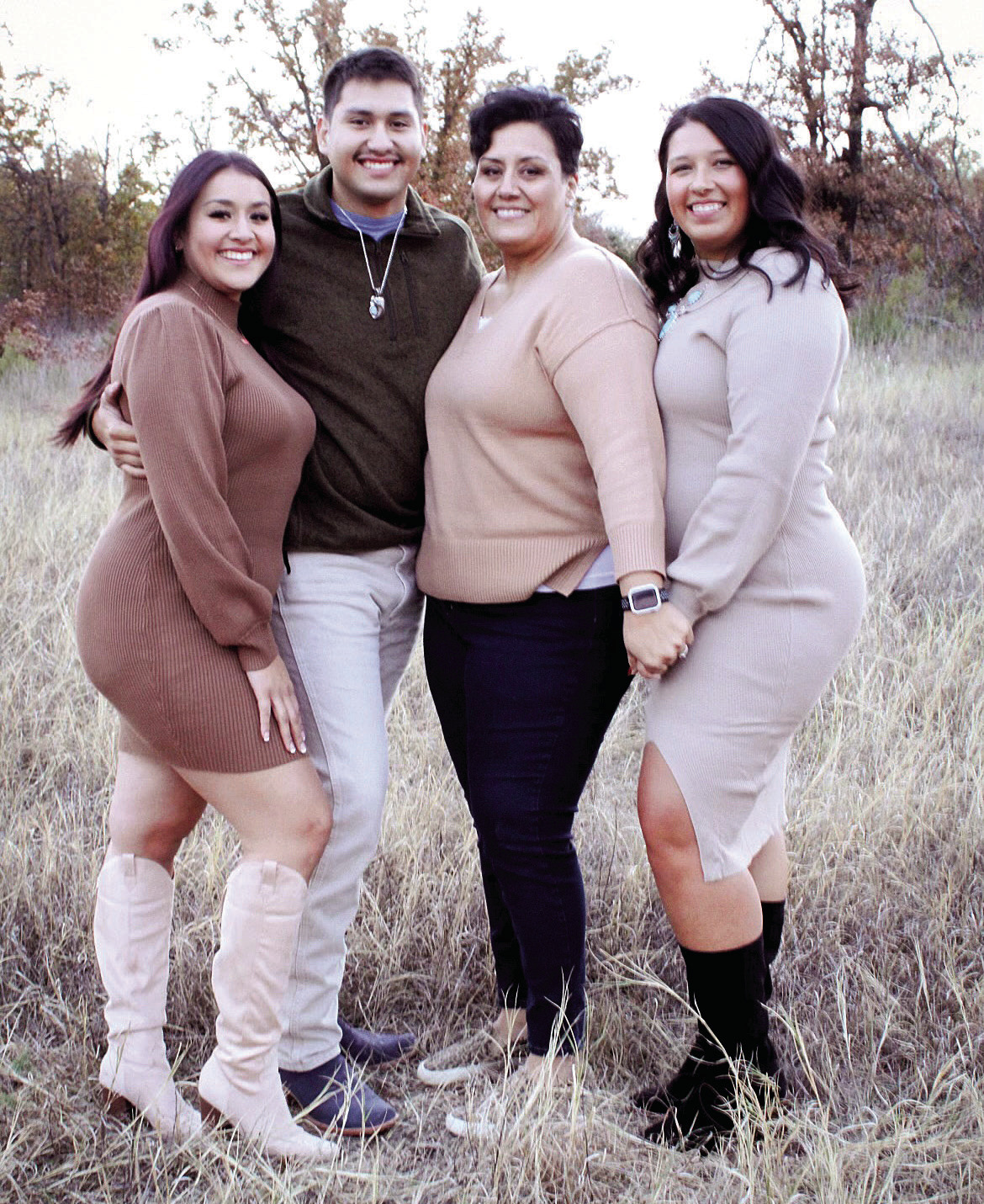 Shawnee Martinez poses with her three children, Khia (Colungo) Meeks and Antonio Colungo to the left and Taylor Kinley on the right.