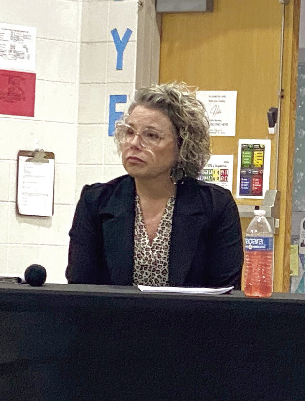 Assistant Superintendent, Brandi Burks listens to Robert Kinsey address the board during the Superintendent’s report. Countywide &amp; Sun/Julie Taton