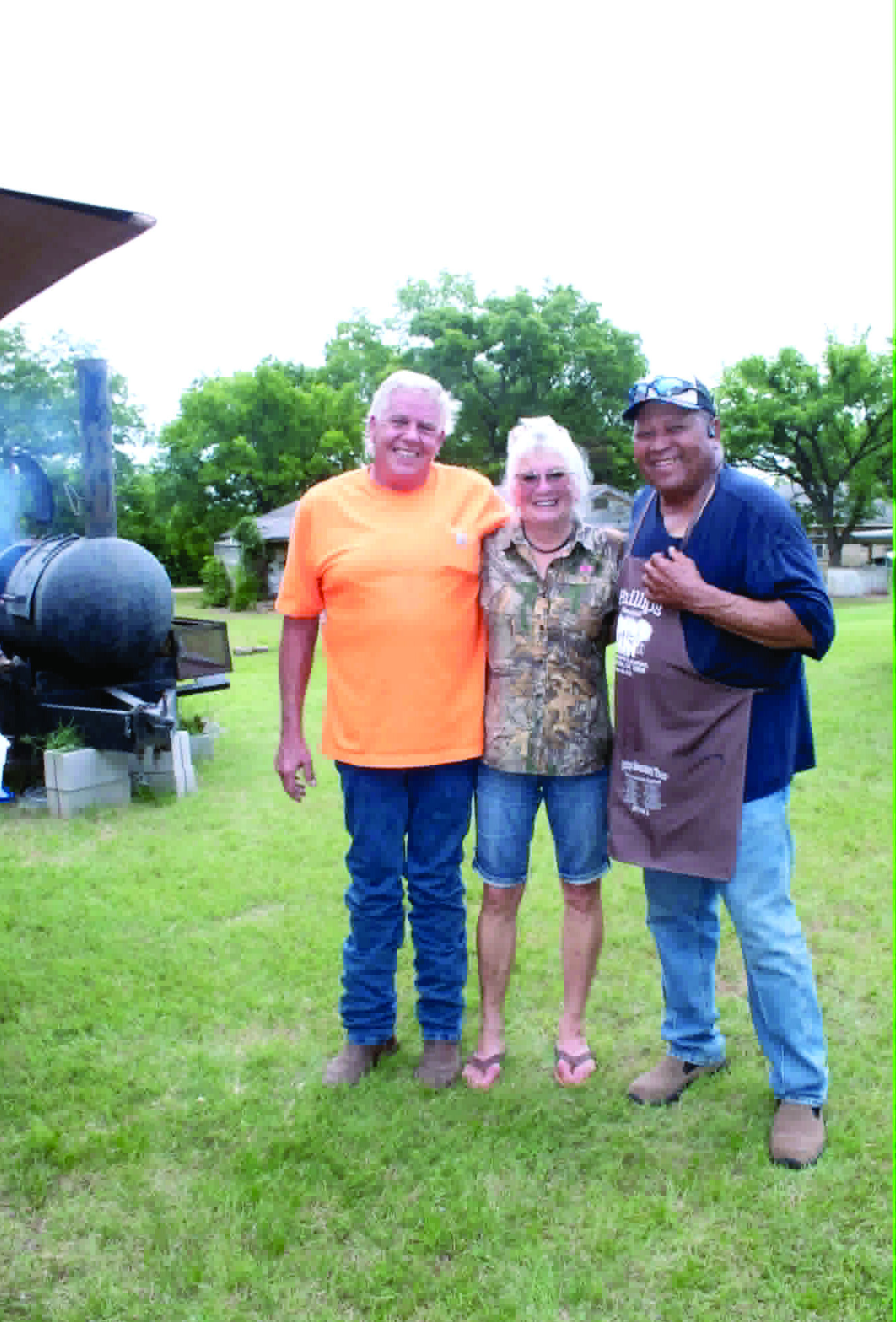 Ronnie and Joy Deatherage, with Carter's Beef in Tecumseh, pose with Frank Phillips of Brooksville. Carter's Beef donated 100 pounds of hamburger for the fundraiser, held at the Brooksville Community Center on June 20. J. Deatherage said the Brooksville community bought a quarter side of beef worth $1,134 for a drawing to raise money for the Brooksville Cemetery pavilion and restroom. Michael Watters won the drawing, and the event raised about $3,000. Photo courtesy of Ashaley Crawford