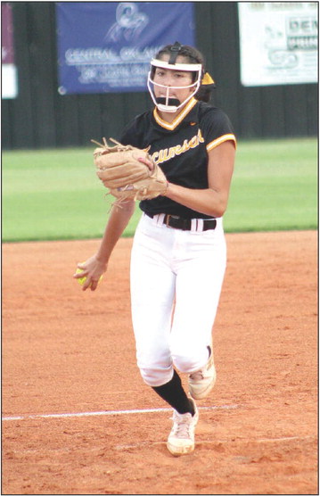 Tecumseh’s Serenity Jacoway winds up to throw it across home during the second inning of the game against Blanchard on Aug. 8. Countywide &amp; Sun/Natasha Dunagan