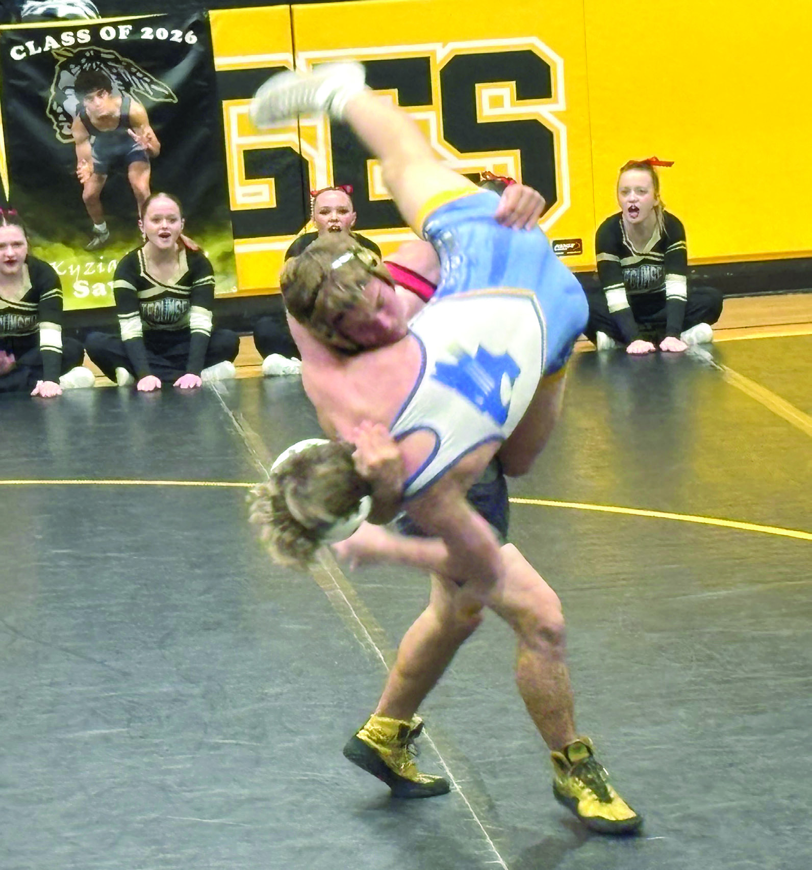 Xzavier Kommer upends his opponent at Tecumseh's home dual on Red Ryder Night, Dec. 4. Kommer won this match. The Savages won their dual 45-24.