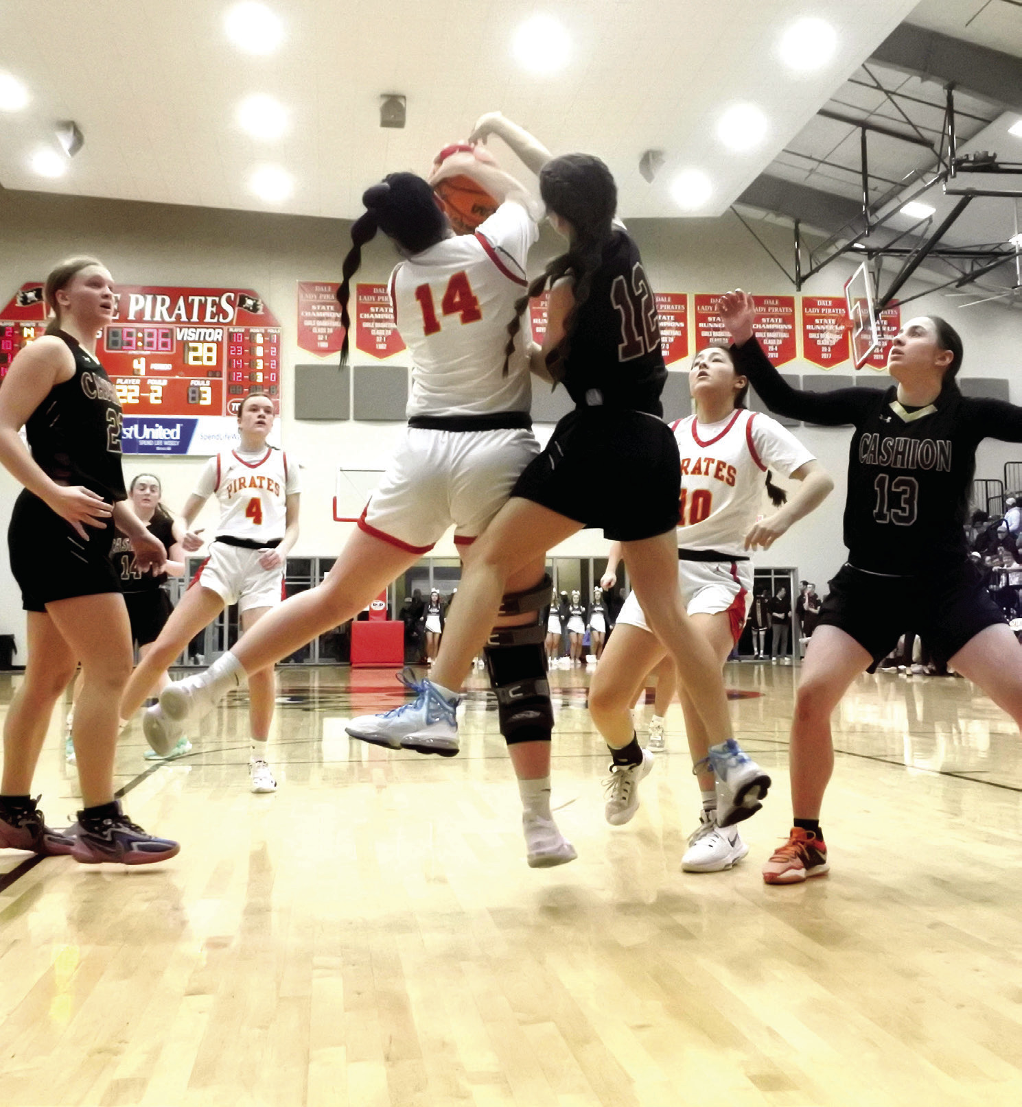 Dale’s Karsen Griggs wrestles the rebound free from a cashion player during the finals of the Regional Tournament at Dale Saturday, Feb. 25. The Lady Pirates won 54-34. Countywide &amp; Sun/Suzie Campbell