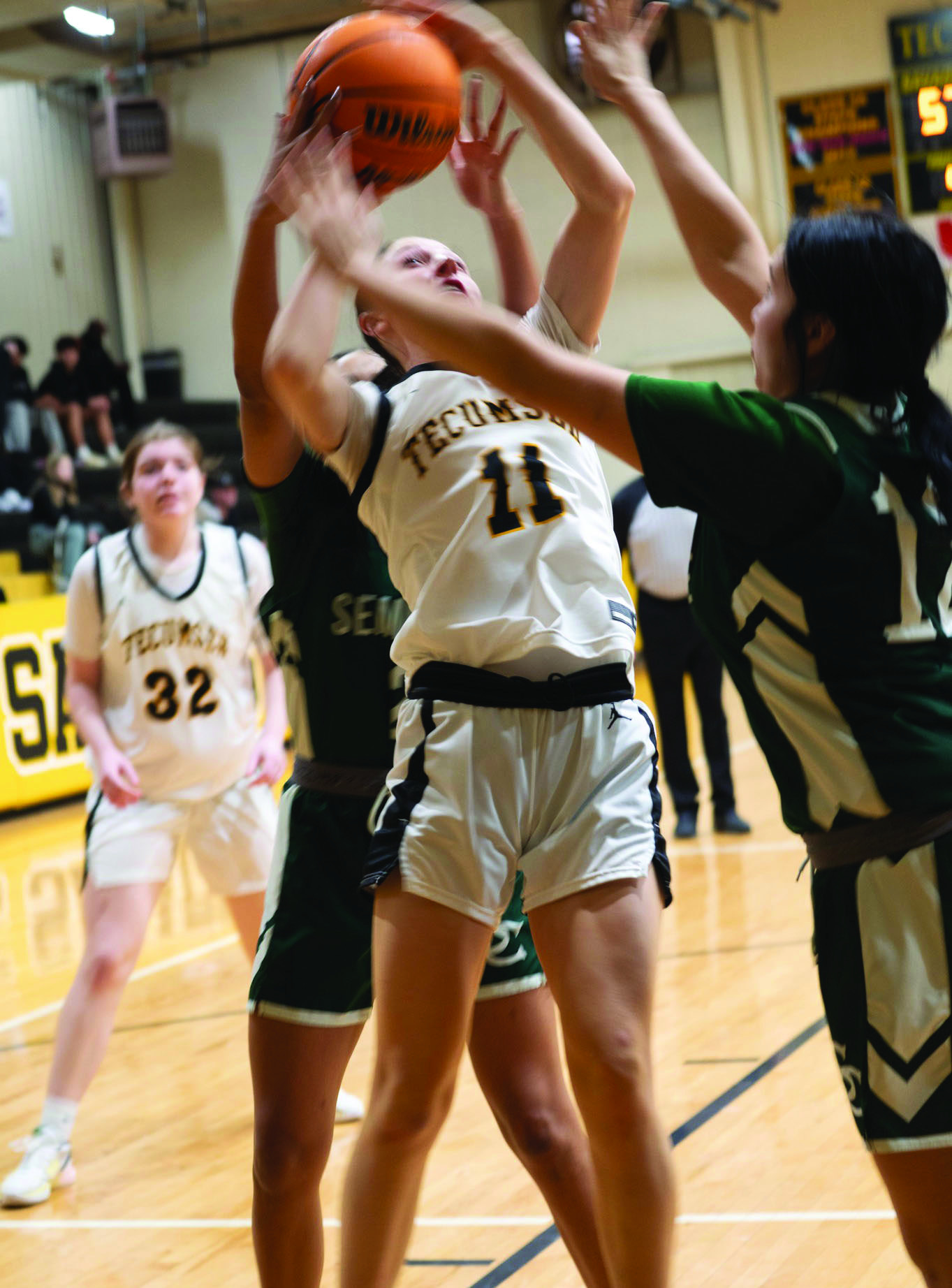 Tecumseh’s Kenzli Warden tries for a basket and is fouled in the home game against Seminole on Jan. 28. The Lady Savages won, 70-27. Photo provided by Kenetta Kay Lisenbee.
