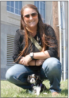 Deputy Haven poses outside the courthouse for a photo with Pottawatomie County Sheriff’s Lieutenant Dakota Black.