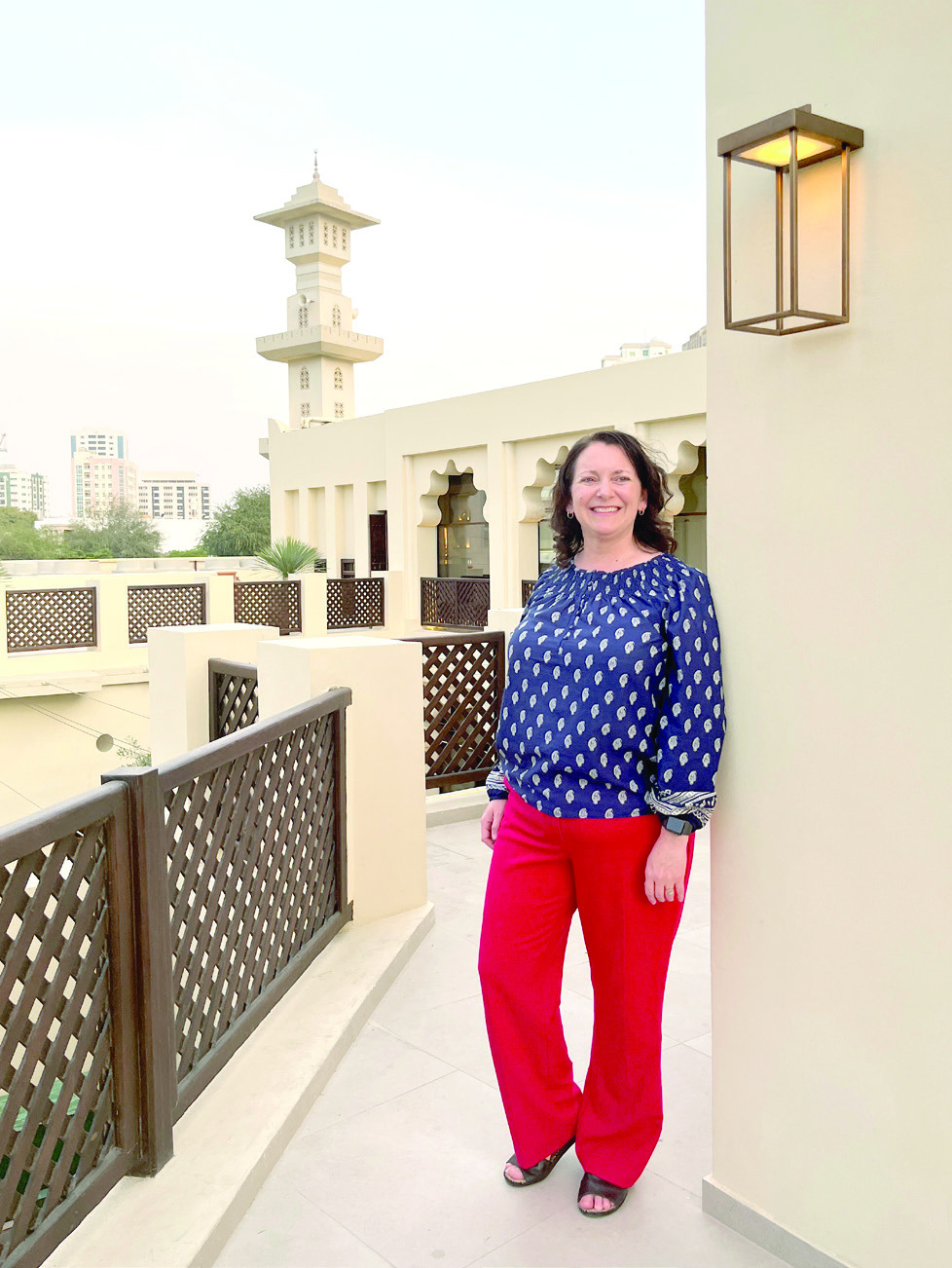 Shawnee Public Schools Director of Library Services and Middle School Librarian Cherity Pennington pauses for a photo in the United Arab Emirates. Pennington was invited to speak at the first ALA Sharjah School Librarians Conference in April. Photo courtesy of Cherity Pennington
