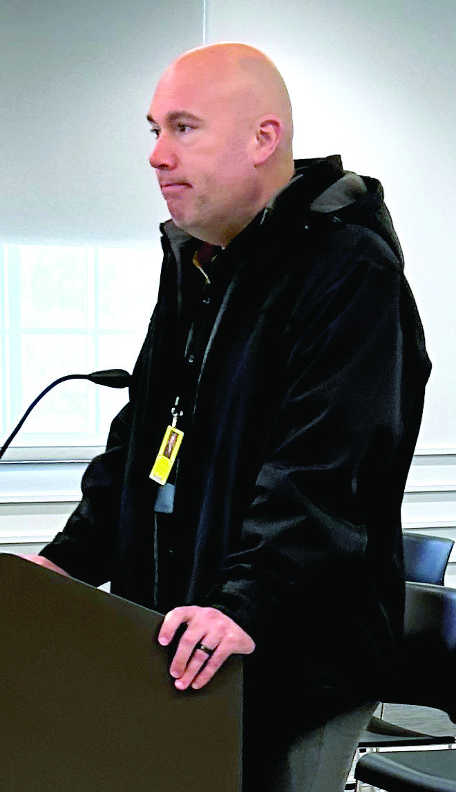 Superintendent Robert Kinsey speaks to the BOCC about the purchase of new iPads and Chromebooks
