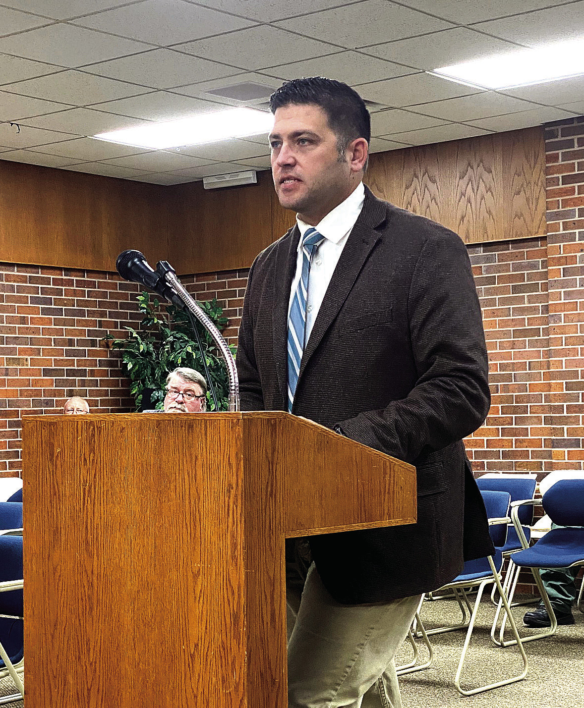 Daniel McClure speaks to the council about his desire to fill the position of City Attorney. Counywide &amp; Sun/Julie Talton