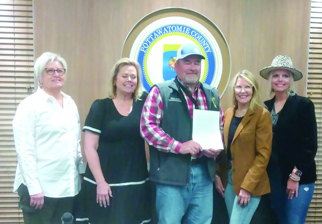 Pottawatomie County Commissioners proclaim May 4-10 Small Business Week. Pictured from left are Uncommon Threads owner Theresa Cody, Shawnee Forward President and CEO Crystal Romanyszyn, Dist. 2 Commissioner Greg Rush, Dist. 1 Commissioner Melissa Dennis, and Dist. 3 Commissioner Abby Thompson. Bill Rooth, Countywide & Sun