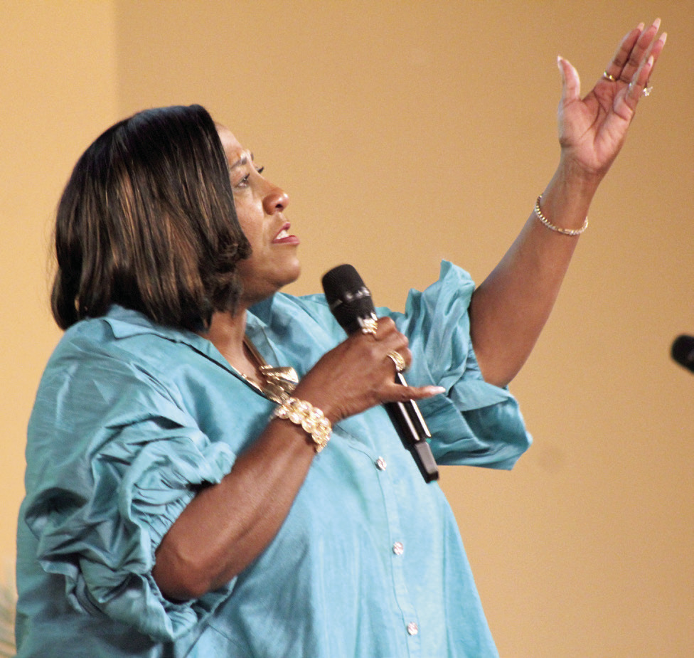 Anise Young sings “Goodness of God” by CeCe Winans at the Juneteenth Reception, held at the Grand Casino Hotel and Resort on June 21. Other musical entertainment at the event included the Alpha Phi Alpha and Beta Eta Lambda Stomp Show, Cletis Lowe, and the trio of Barbara Cooks, Galian Murphy and Willie Huffman. File photo