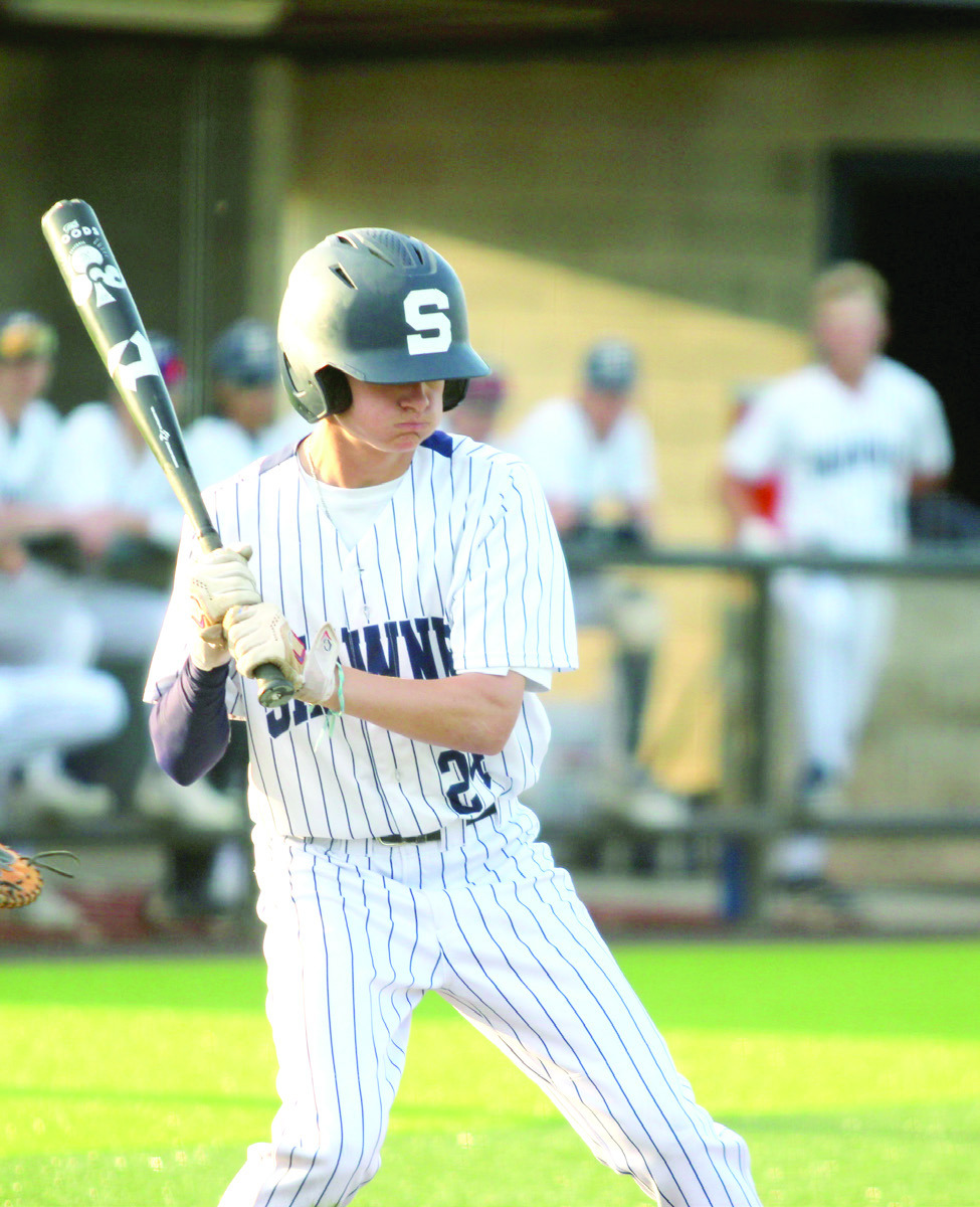 Shawnee freshman Ethan Berger passes on a ball in the March 25 home game with Coweta. Natasha Dunagan, Countywide & Sun