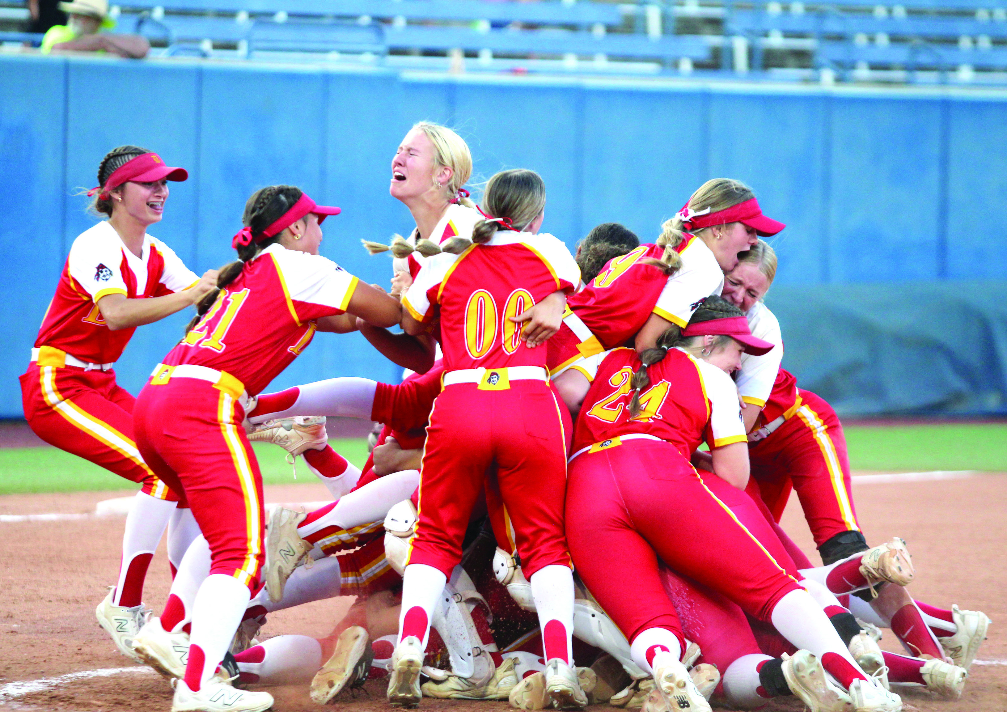 The Dale Lady Pirates Fast-Pitch Team makes a dogpile after winning the OSSAA Class 2A Fast-Pitch Softball State Championship, held at Devon Park in OKC on Oct. 12. The Lady Pirates topped Howe, 10-0, on Oct. 10, and beat Oktaha, 2-0, on Oct. 11, before narrowly claiming victory with Pocola, 1-0. The score was 0-0 until the bottom of the seventh inning when Dale finally got one across home plate. Their record this season is 42-1. Countywide & Sun/Natasha Dunagan