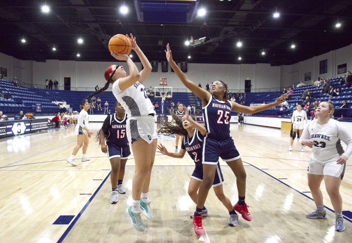 Senior Serenity Whipkey shoots two in the Feb. 14 game against Nathan Hale. The Lady Wolves dominated the court with a 59-3 win. Countywide & Sun/Julie Talton