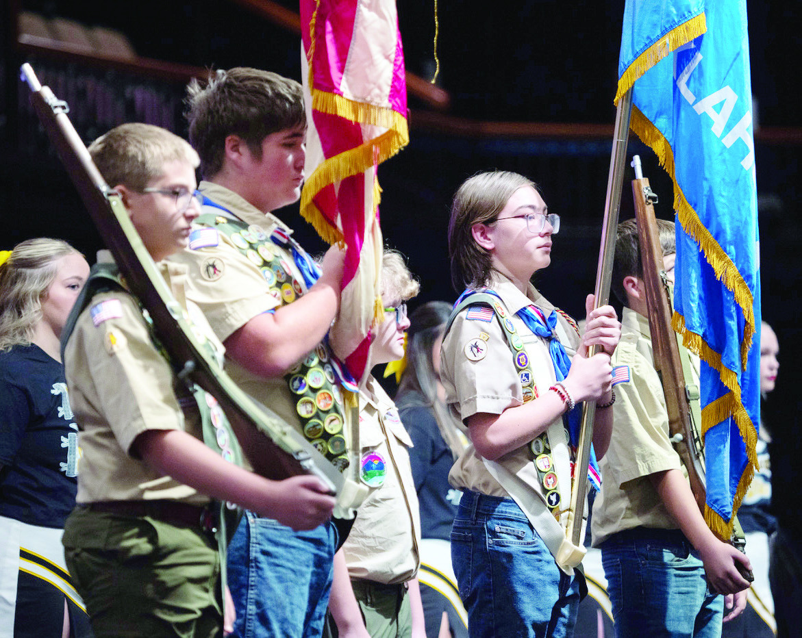 Members of Scout Troops #417 and # 477 Color Guard present the colors during the opening ceremony. Photo by Jesse Monday Media
