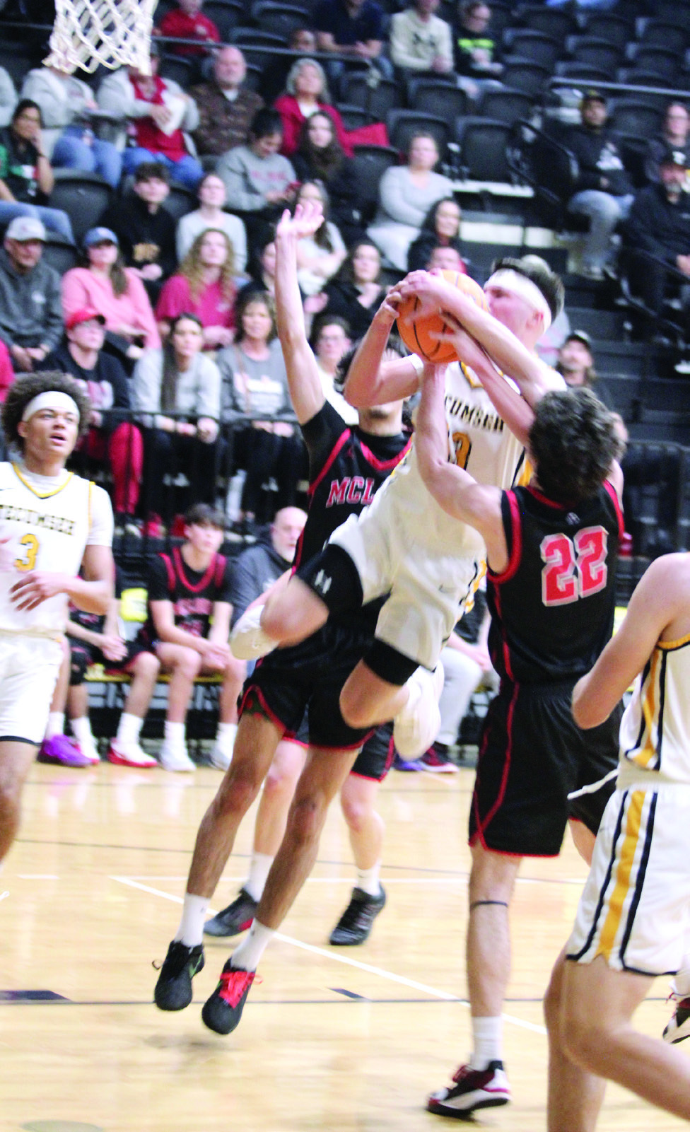 Tecumseh senior Creed Wright jumps for the basket and is fouled during the Feb. 3 home game against McLoud. The Savages won 70-64 in overtime. Photos by Natasha Dunagan, Countywide & Sun