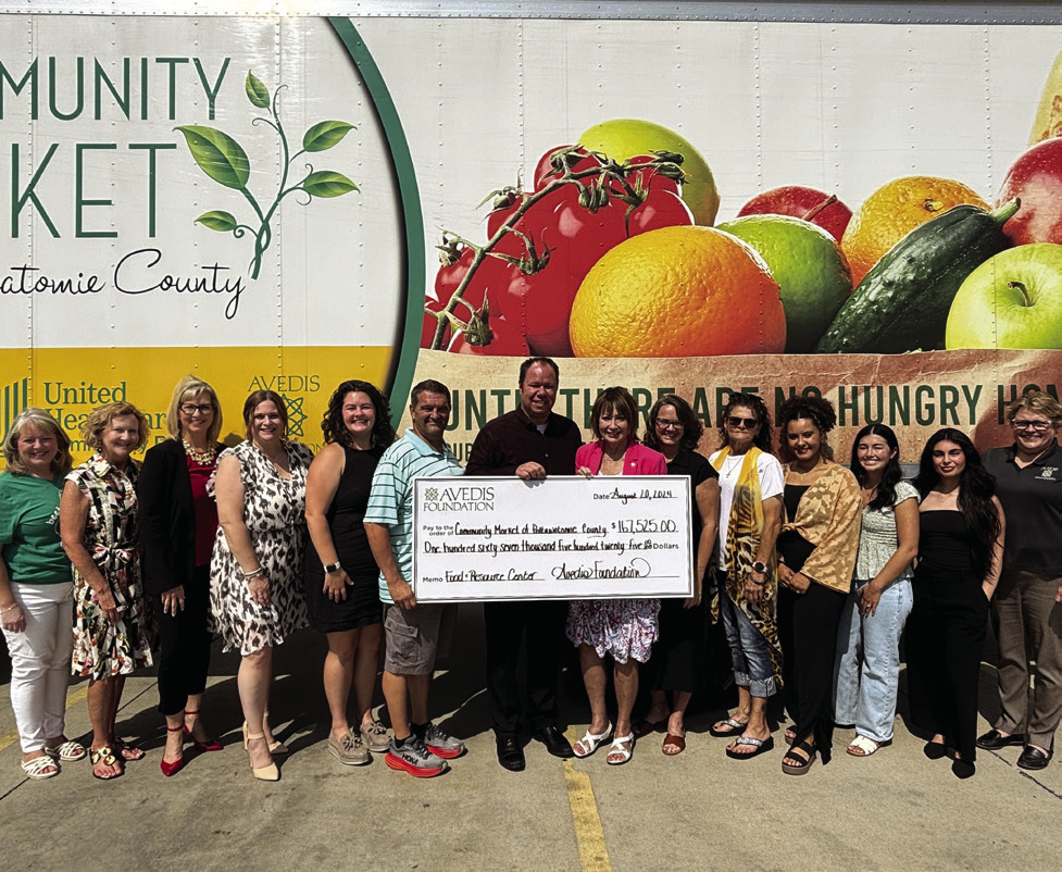 Board Members &amp; Staff from Community Market and Avedis Foundation are pictured together with Jill Spencer, Board Chair Avedis Foundation, Daniel Matthews, Executive Director CMPC, and Dr. Kathy Laster, President &amp; CEO Avedis Foundation. Photo Provided.