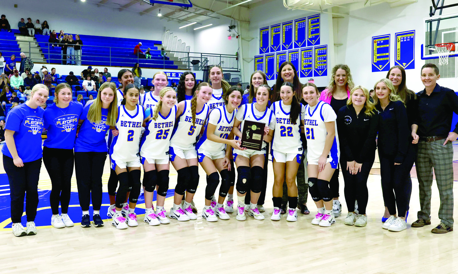 The Bethel Lady Wildcats and their coaches pose with the Class 3A District Basketball Championship trophy after beating Lexington on Feb. 20. They advanced to the Regional Tournament on Feb. 24 in Jones. Photo courtesy of Richelle Treece