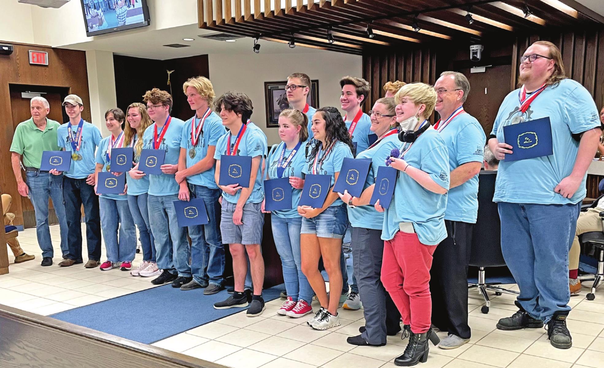Gordon Cooper Technology Center Robotics Team, Sprockets FIRST Team #2341, is presented with a certificate of recognition during the Shawnee City Commission meeting Monday, May 16. The team won the Engineering Inspiration Award at the 2022 FIRST Championship in Houston. Countywide &amp; Sun/Loren Knight