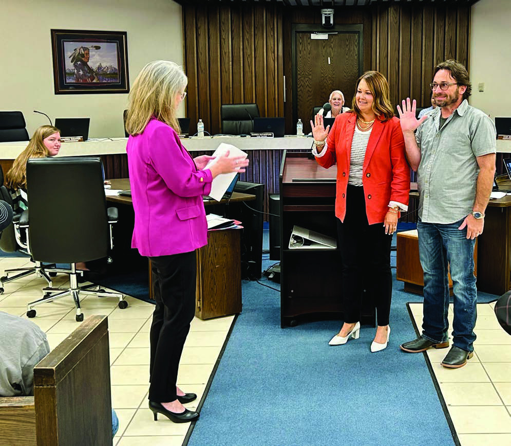 City Clerk Lisa Lasyone (pictured left) swears in Ward 4 Commissioner Ashley Fichtner (center) and Ward 3 Commissioner Chris Odneal (right). Photo provided by City of Shawnee
