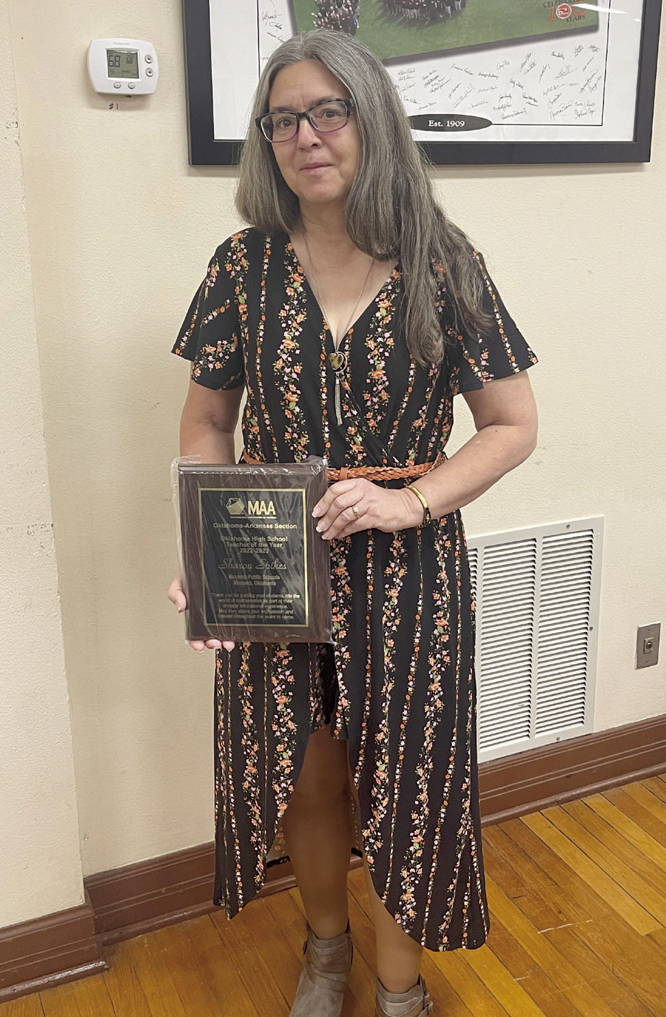 Macomb High School Math Teacher Sharon Spikes poses with her Mathematical Association of America Oklahoma Teacher of the Year Award. Photo provided.