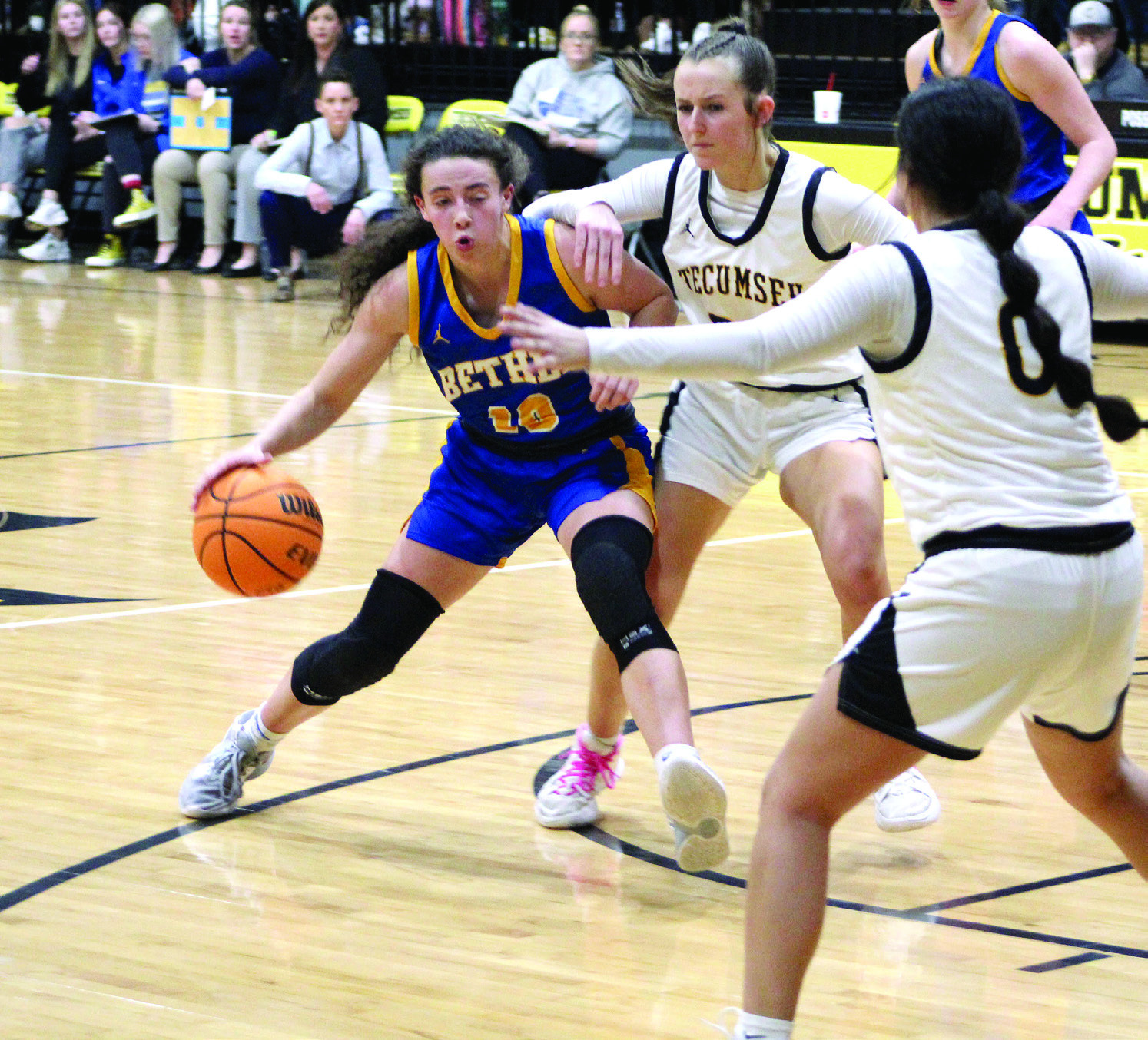 Bethel’s Parker Stevenson makes her way toward the basket before eventually making a three-pointer in the second quarter of the game at Tecumseh on Feb. 3. The Lady Savages lost, 42-56. Countywide &amp; Sun/Natasha Dunagan