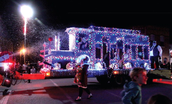 The 'Whoville Express,' pulled by a City of Tecumseh utility truck, makes its way down Broadway in the Grinchmas Parade on Dec. 11. Out of 65 entries, the City of Tecumseh placed first, with Ollie's in second and BancFirst in third, said Tecumseh Chamber of Commerce Executive Director Kim Elliott. Natasha Dunagan, Countywide &amp; Sun