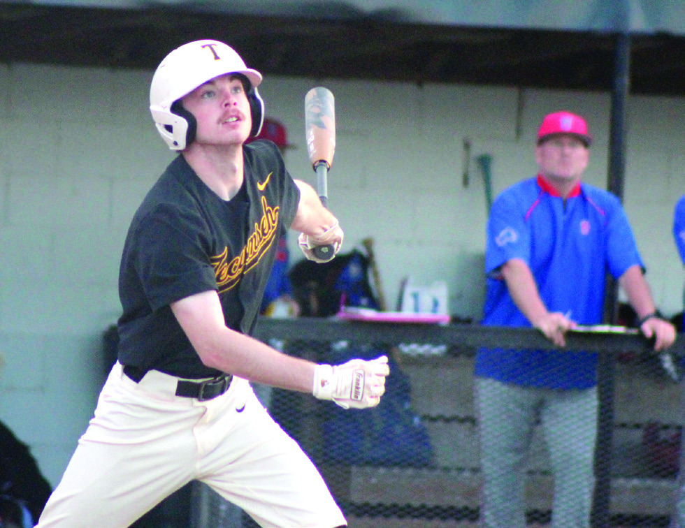 Tecumseh senior Malachi Boyce watches the ball before running to first during the home game with Chandler on March 7. The Savages lost, 6-11. Countywide &amp; Sun/Natasha Dunagan