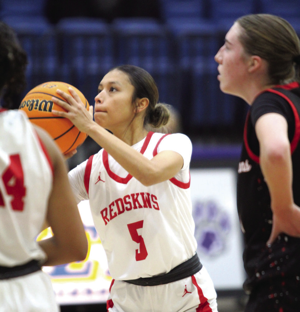 McLoud junior Kaitlyn Valdez concentrates on her foul shot during Bethel’s First United Tournament game against Perkins-Tryon, Dec. 12. The Lady Redskins won that game, 57-32; ended Eufaula on Dec. 13, 42-28; and beat Blanchard on Dec. 14, 33-24, to become tournament champions. Countywide & Sun/Natasha Dunagan