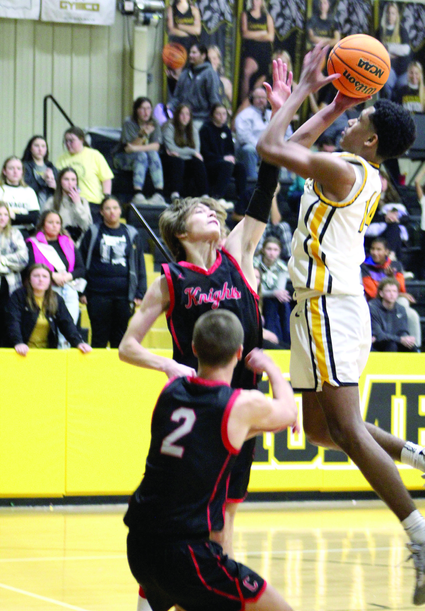 Tecumseh junior Jase Edwards aims for the bucket in the last 30 seconds of the fourth quarter during the Class 4A District game against Crossings Christian on Feb. 17. The Savages lost 67-84. Countywide &amp; Sun/Natasha Dunagan