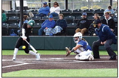 Right: Tecumseh High School Alumna, Jessi Hull, now playing for OBU, hits a single before eventually making it across home plate to score in the Fall Softball Scrimmage against Eastern Oklahoma State held at FireLake Softball Complex on Oct. 27.