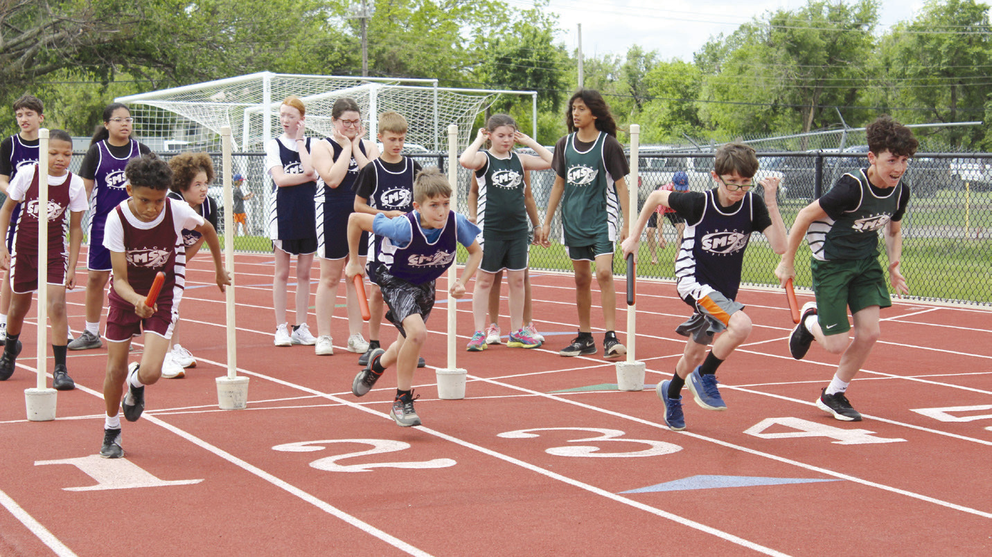 Four sixth-grade boys from Shawnee Middle School start off the Division One Shuttle race.
