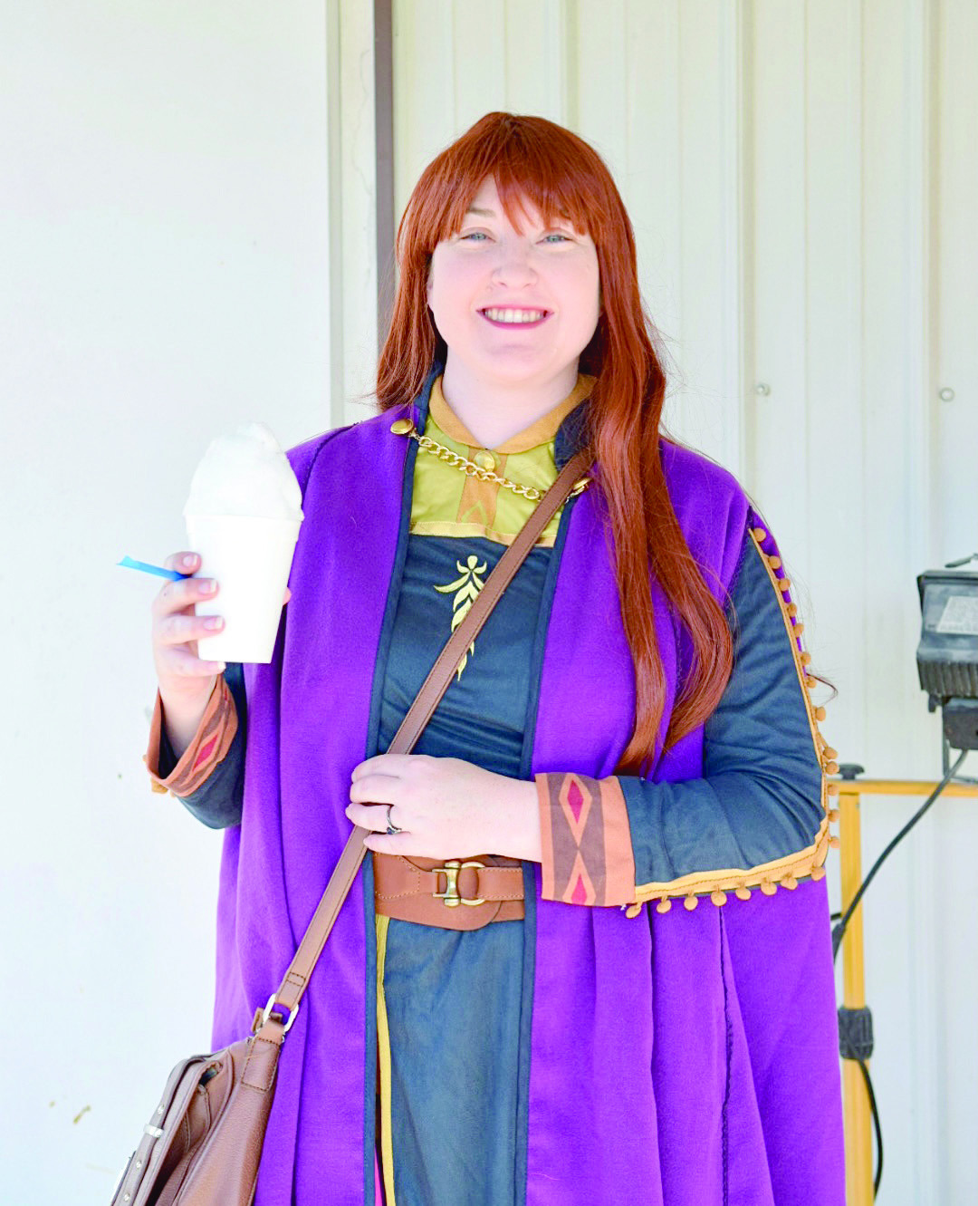 Pictured left, Princess Anna, aka Rachelle Briscoe of Shawnee, enjoys a free “Frozen” treat at the Johnson Festival held on September 30th at the Horseshoe Bend Community Center. Countywide/ Sun Julie Talton