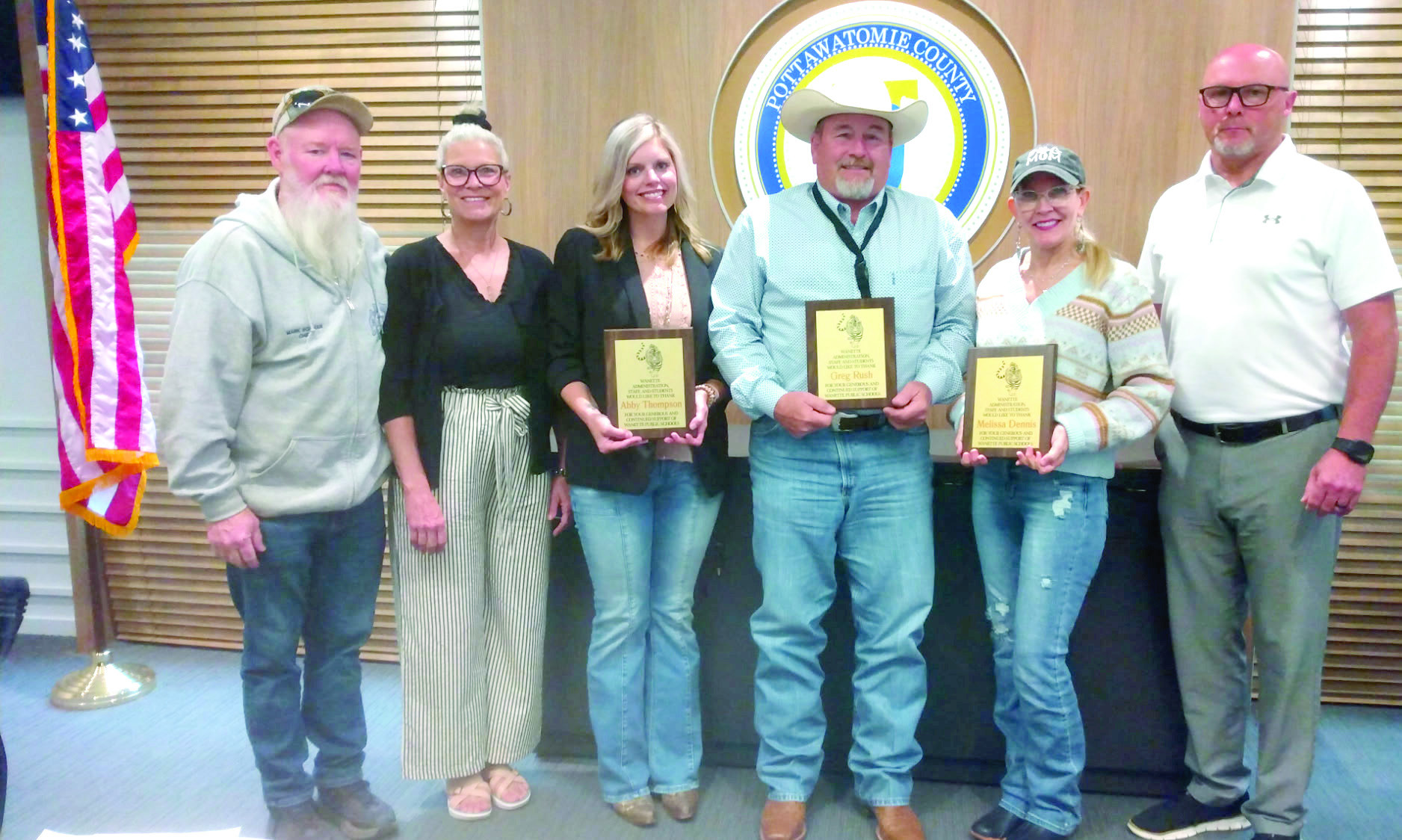 Wanette Public Schools (WPS) awards Commissioners plaques of appreciation for their assistance in purchasing the first school buses owned by the school. Pictured from left: WPS Maintenance Supervisor Mark Rodman, WPS Principal Cindy Horn, County Commissioners Abby Thompson, Greg Rush, and Melissa Dennis, and WPS Superintendent Scott Douthit. Bill Rooth, Countywide &amp; Sun