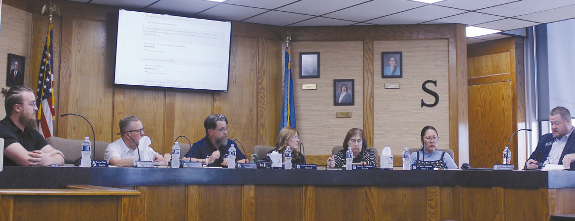 Dr. Jason James, Shawnee Superintendent, far right, wraps up his report to the Shawnee Public Schools Board of Education at their regular meeting on Aug. 4. Shown, from left, are Turner Bass, Russ Oliver, President Clif Harden, Jeanne Swinney, Mandy Hillhouse and Kristen Wilson. The Board meets on the first Monday of each month (except in July). Natasha Dunagan, Countywide & Sun