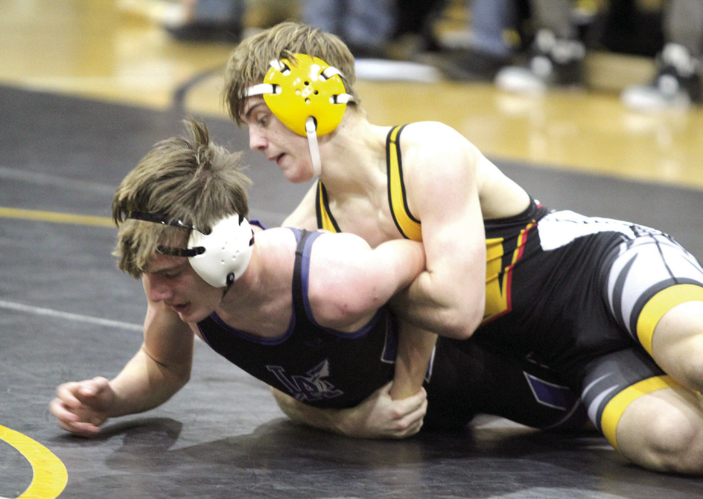 In the 138 weight class, Tecumseh’s Tyler Bryant, top, tries to flip his Little Axe opponent during the Dec. 3 home dual. Little Axe won the season opener, 51-30., but the Savages beat Bethel on Dec. 5, 53-21. The Lady Savage wrestlers will face Harrah today (Dec. 12) at the Alumni Center, beginning with junior high girls and boys at 6 pm. Then, on Dec. 17 at the Alumni Center, the Savages and Lady Savages will square off against Chandler. Countywide &amp; Sun/Natasha Dunagan