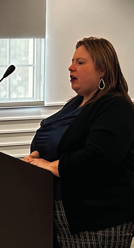 April Grant addresses the County Commissioners regarding the request to reallocate funds previously awarded to Rose Rock Habitat for Humanity. Suzie Campbell, Countywide & Sun