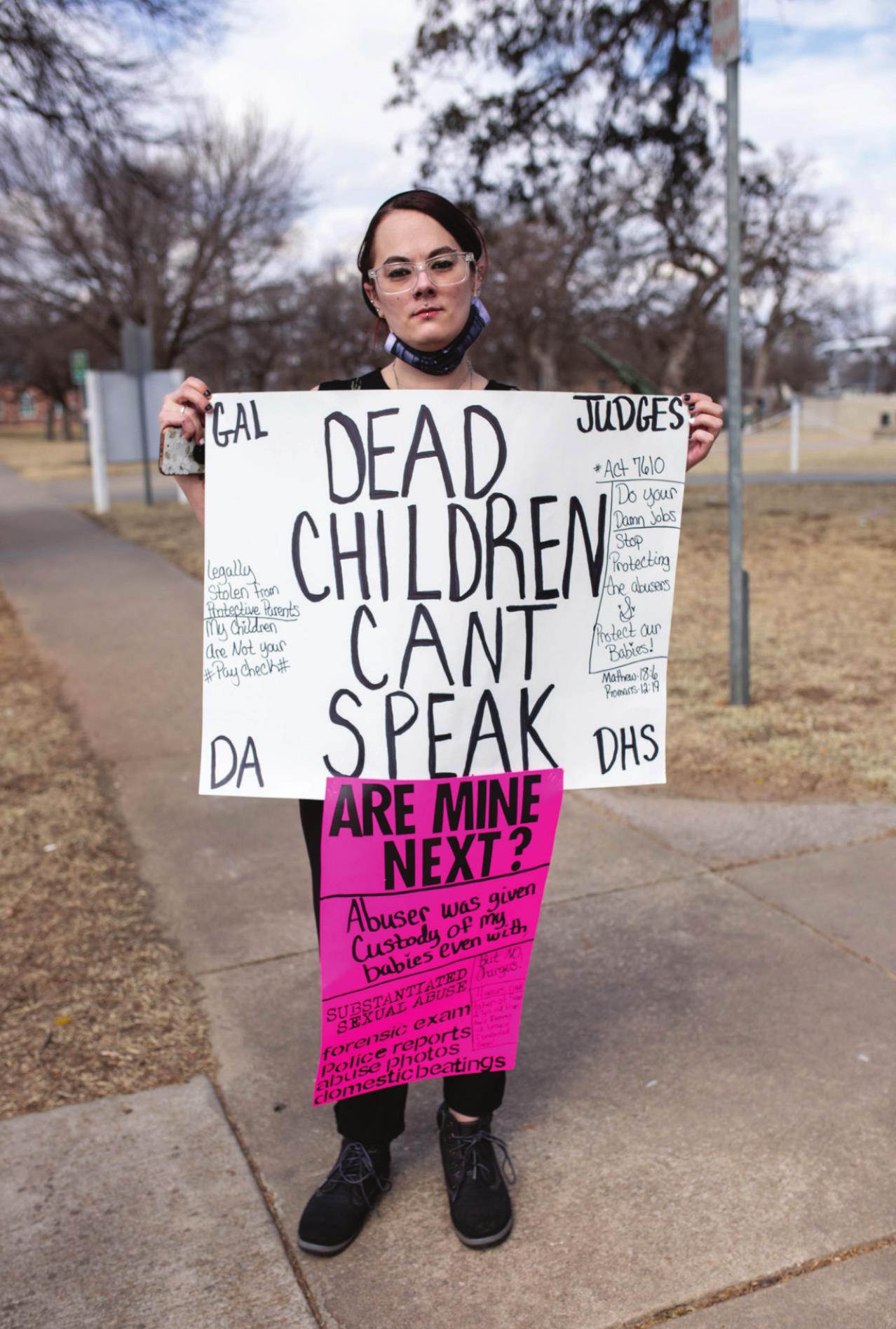 Chelsey Pearson joins protestors outside the Pottawatomie County Courthouse Friday, Mar. 4. Countywide &amp; Sun/Loren Knight