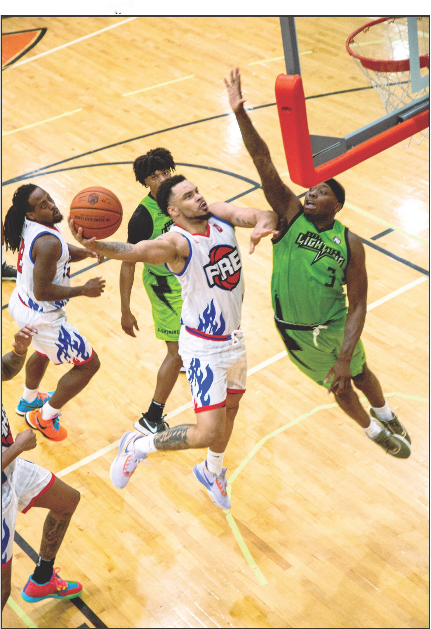 Potawatomi Fire’s Deshawn Munson goes in for a layup during the recent game against the Little Rock Lightning. Photo by Landon Kidney