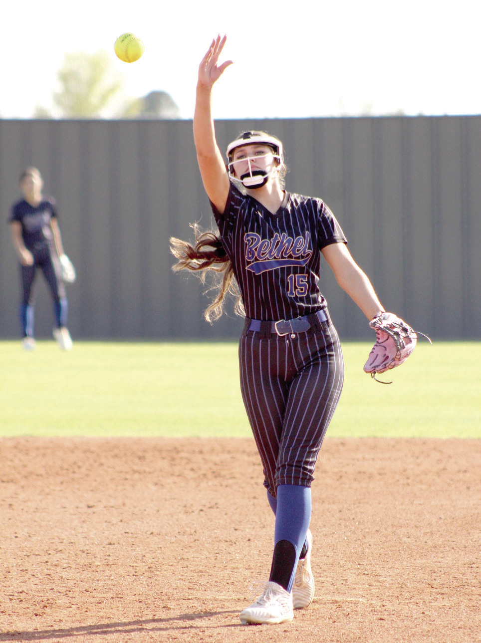 Bethel sophomore Kinley Anthony lofts the ball toward home plate.