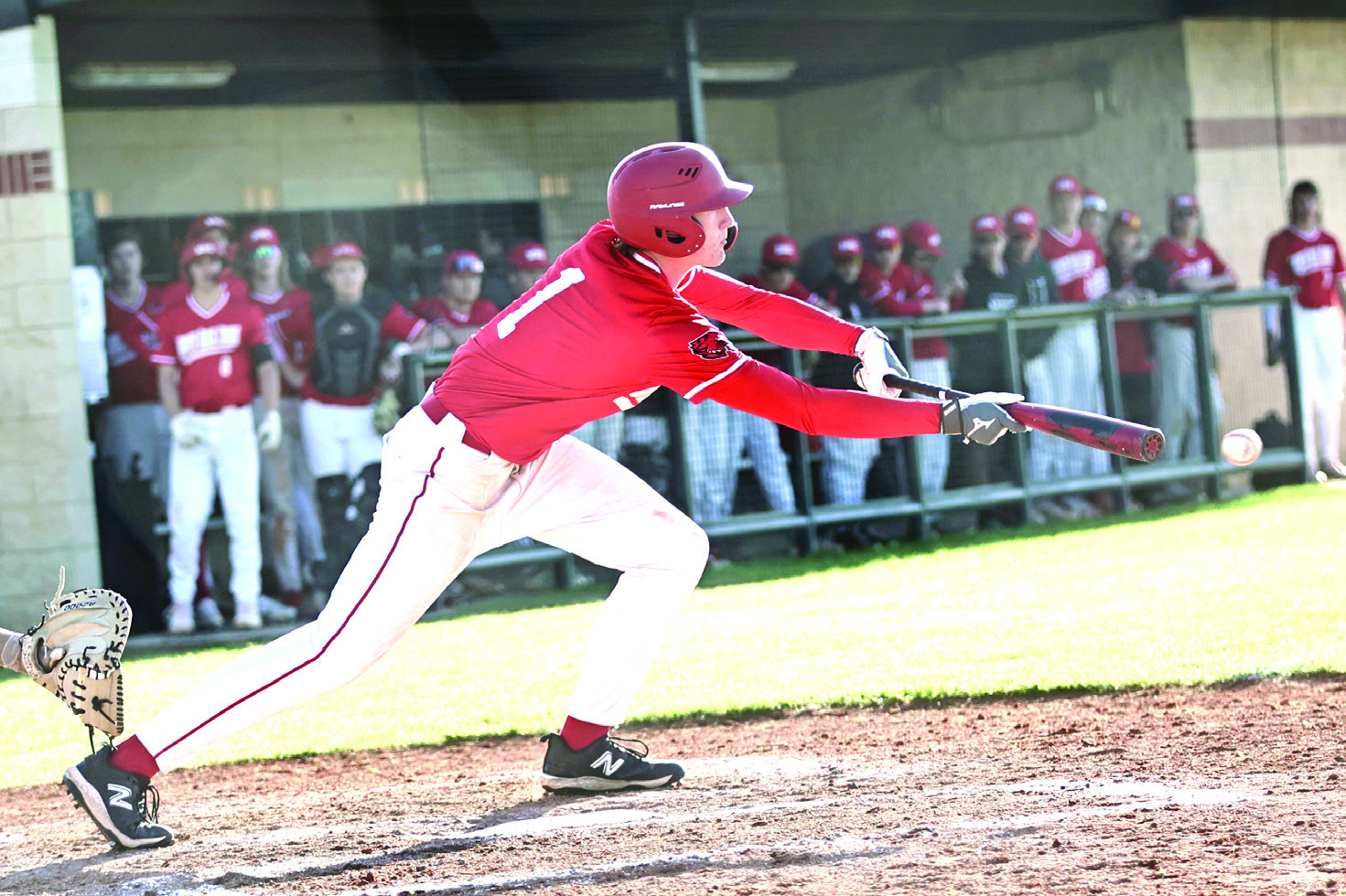 North Rock Creek’s Gus Snodgrass lays down a bunt in the game against Perkins, Monday, Mar. 27. Photo courtesy of Gowin Phonotography