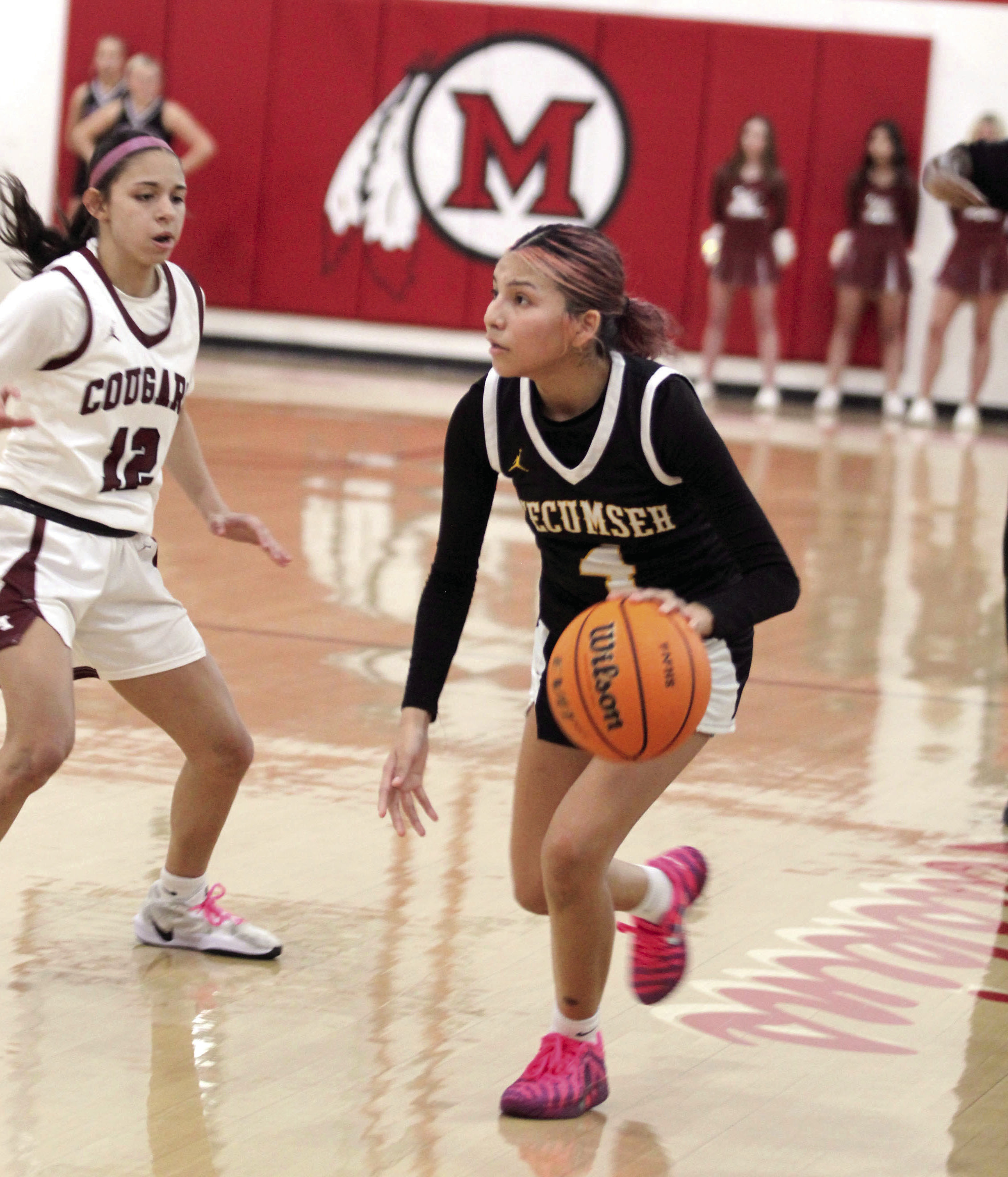 Tecumseh junior Livia FourHorns looks for an opening to pass in the fourth quarter of the Class 4A Regional Consolation Bracket game against Ada, held at McLoud on Feb. 26. The Lady Savages lost, 32-42, ending their season. Photos by Natasha Dunagan, Countywide & Sun