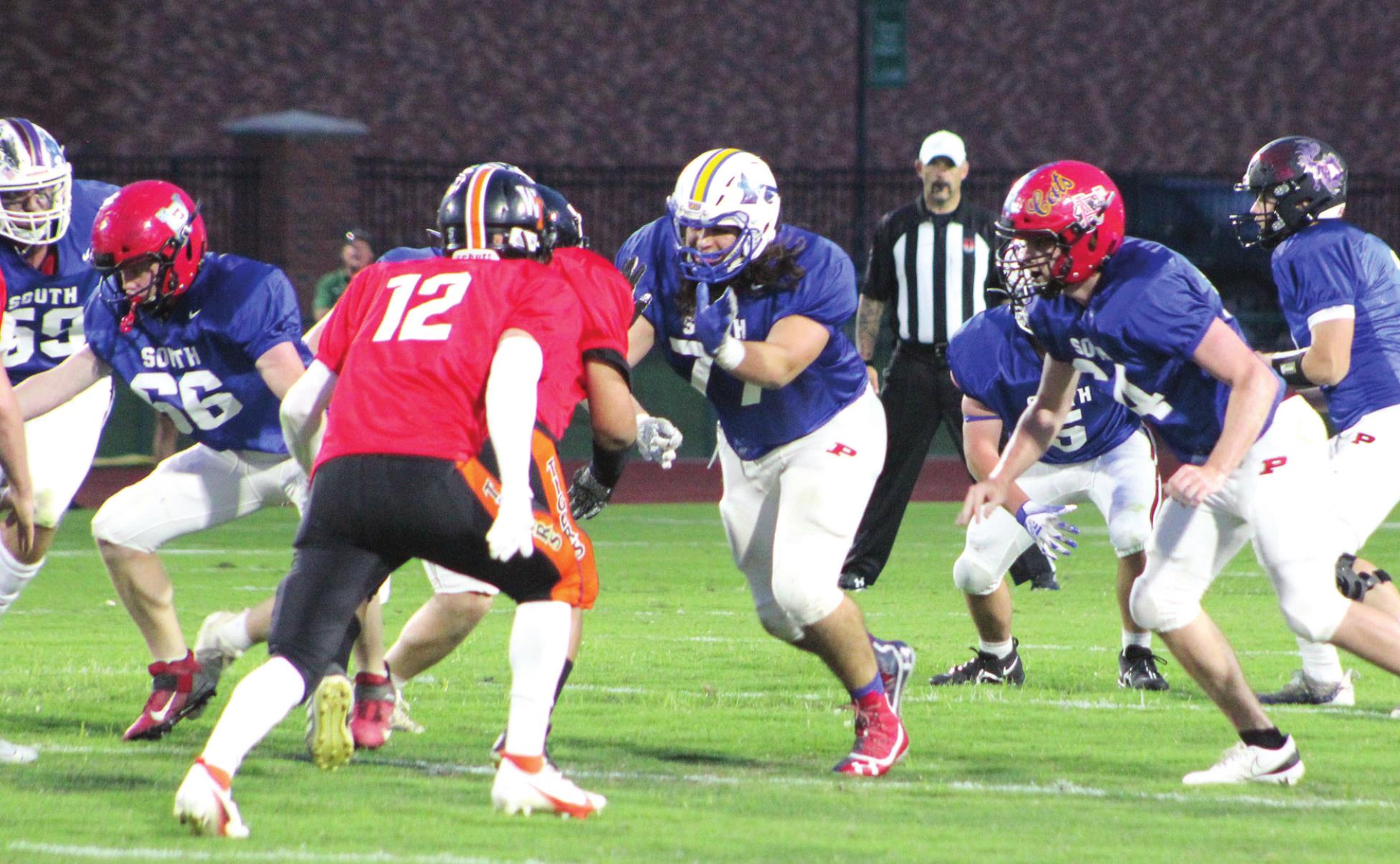 Bethel graduate Dominick Contreras (#77), on the South Team, blocks a North Team player during the Second Annual Citizen Potawatomi Nation All-Star Bowl, held at OBU on June 3. Michael Parsons, also of Bethel, played on the South Team, as well, and they won 26-6. Countywide &amp; Sun/Natasha Dunagan