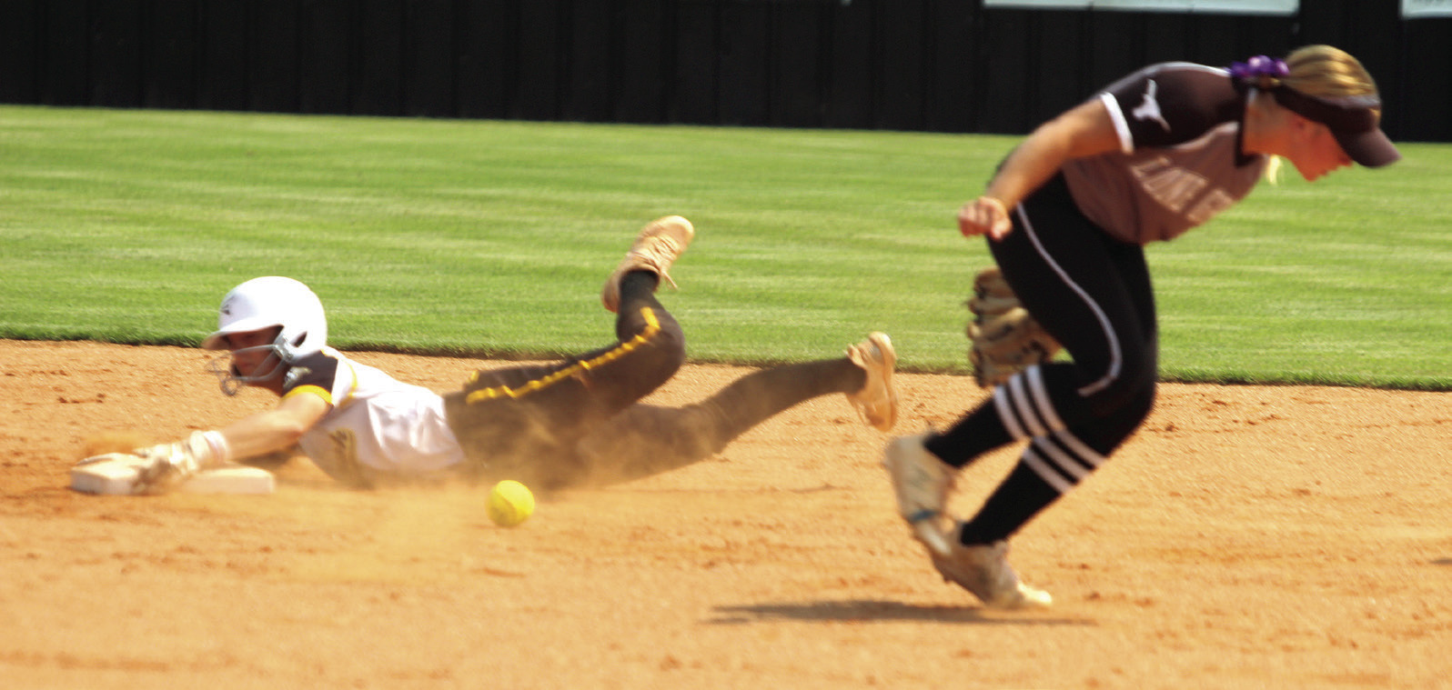 Tecumseh senior Cadence Leba steals second base and hangs onto it during the Dale-Tecumseh Tournament game against Lone Grove on Sept. 4. Natasha Dunagan, Countywide &amp; Sun