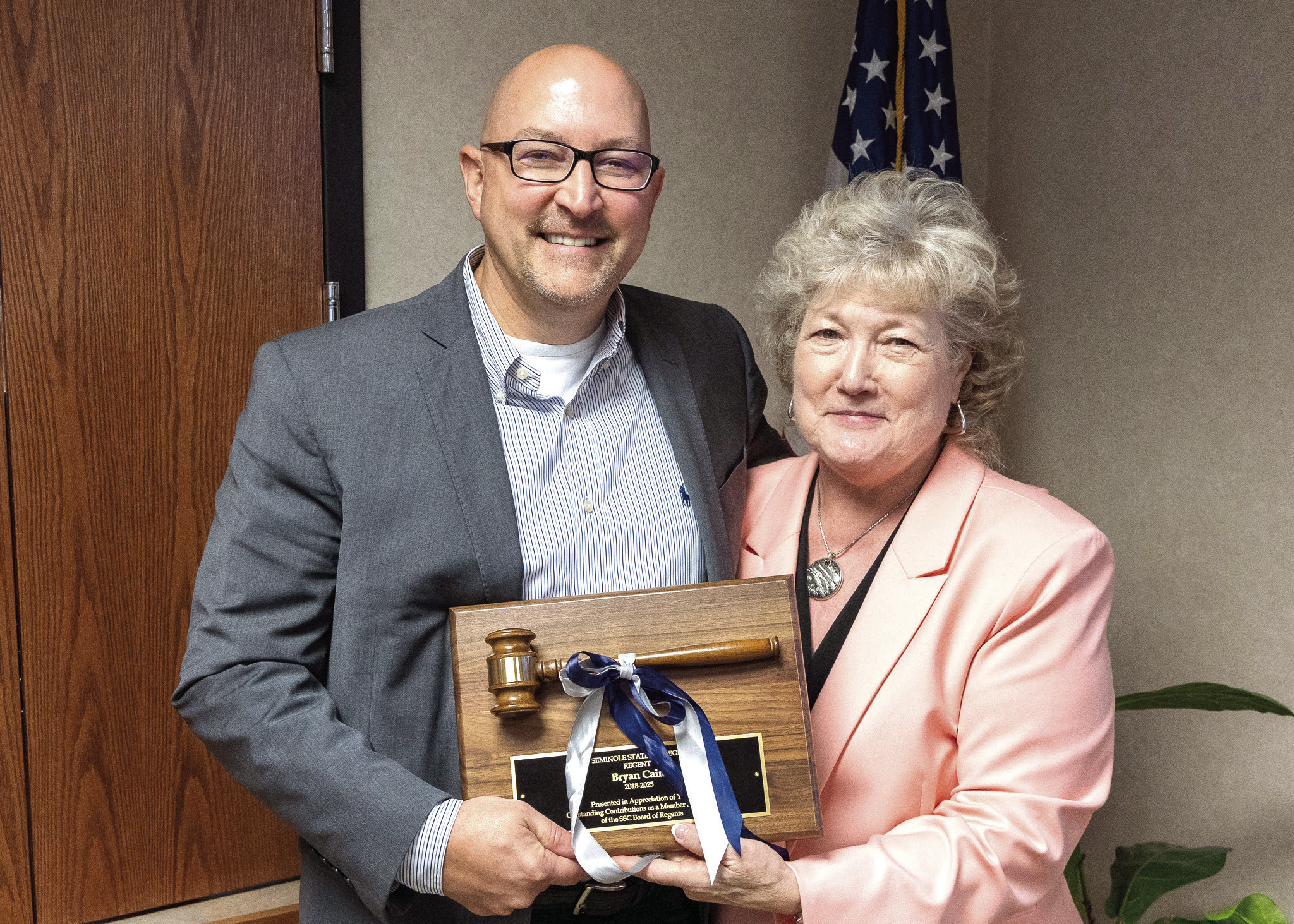 SSC Board of Regents member Bryan Cain (left) was recognized for his service to the College at the meeting on June 9. Following the meeting, President Lana Reynolds (right) presented him with a plaque and gavel, commemorating his time at the College. Photo provided by SSC