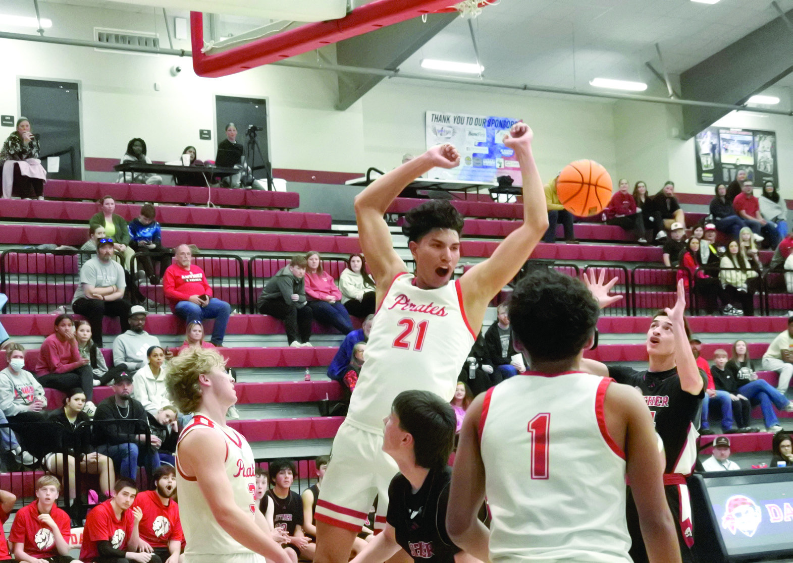 Dale junior Keldan Meely celebrates after a slam dunk during the Class 2A District home game against Luther on Feb 19. The Pirates won, 94-18, advancing to the Regional Tournament hosted by Dale beginning Feb. 24. Cheyanna Dietz, Countywide &amp; Sun Intern