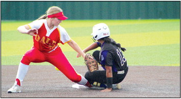 Dale’s Teague Muncy tries to tag a Red Oak runner that has slid onto her foot, but the ball has escaped her glove, during the Dale Festival at FireLake Ball Fields on Sept. 15.