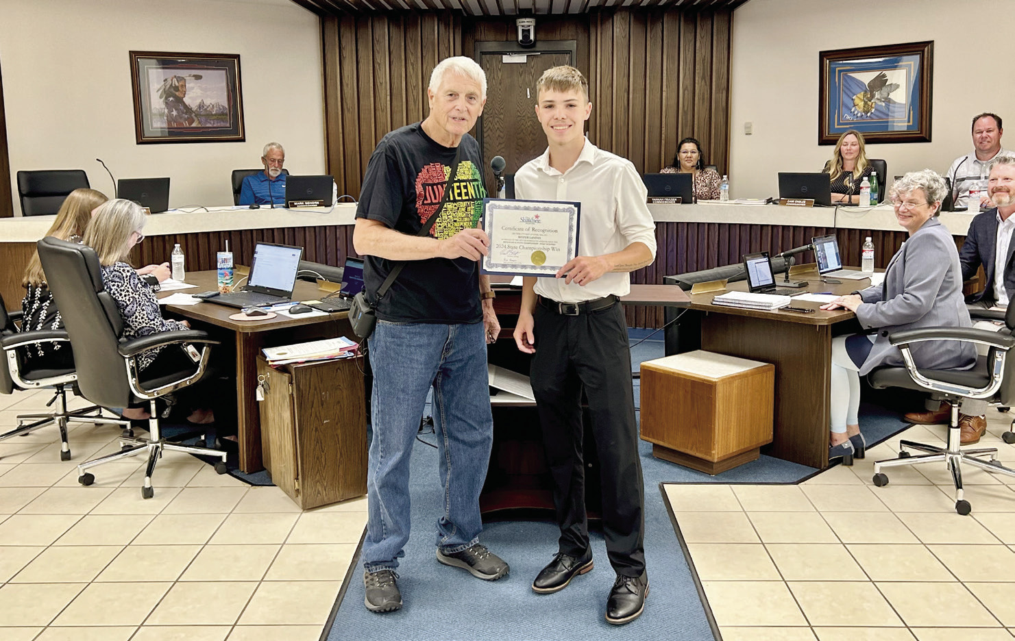 Mayor Ed Bolt recognizes Shawnee High School Pole Vaulting State Champion Keifer Landes during the June 17, 2024 meeting. Countywide & Sun/Suzie Campbell
