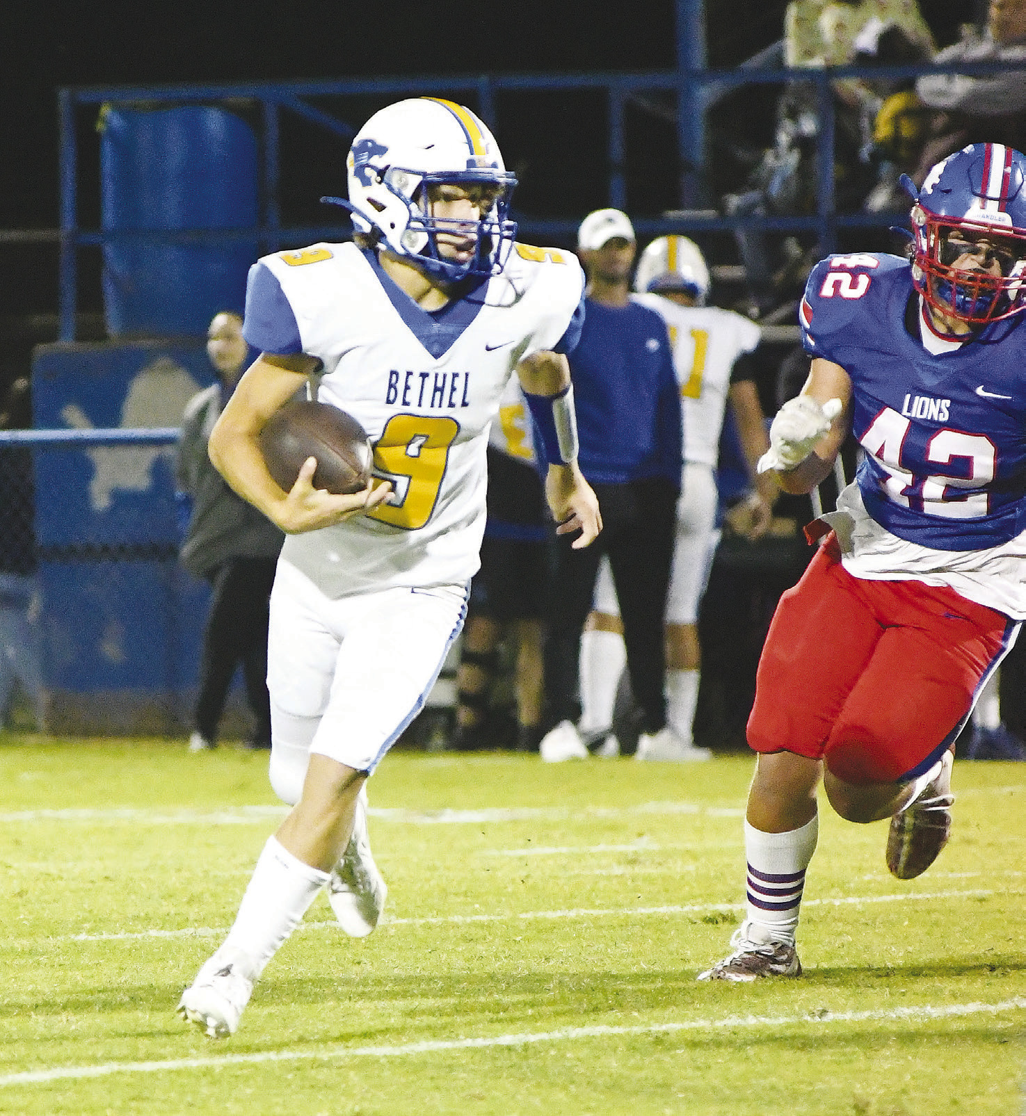 Bethel’s Maddox Davis (9 )tries to elude Chandler’s SamHall (42).