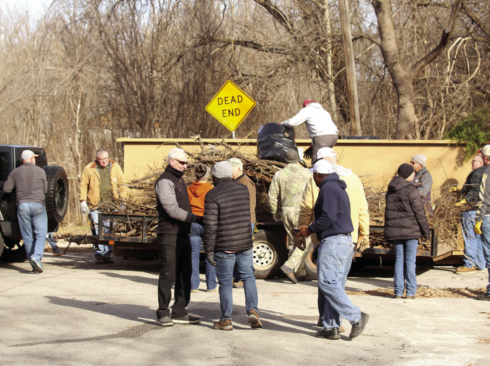 Volunteers spend the holiday working in Dunbar heights. Photo provided